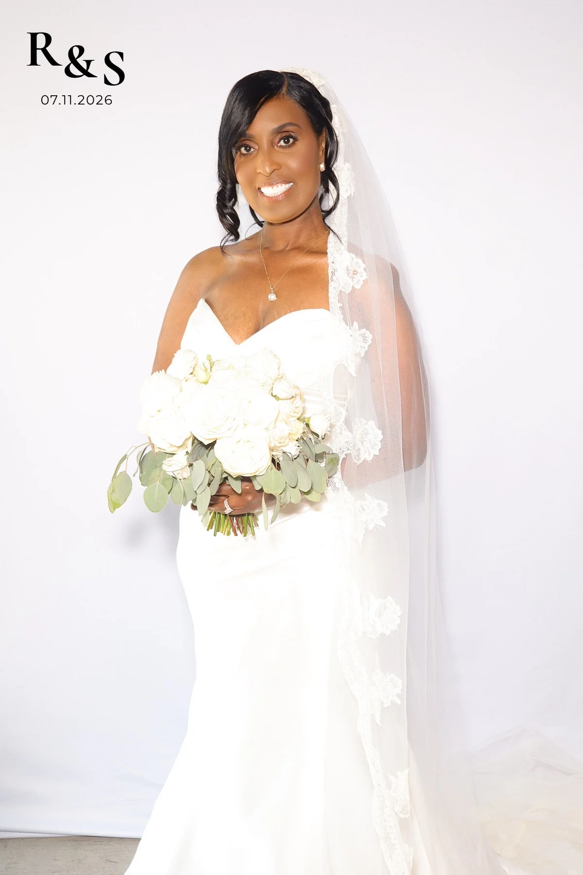Rosie in her wedding dress holding a bouquet