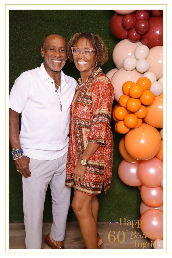 JJ Rock – family enjoying the digital photo booth experience at a 60th birthday celebration in Oshawa, Ontario featuring fun props and smiles for the camera