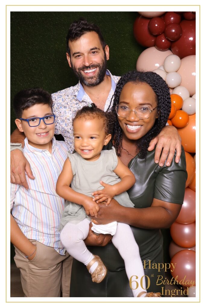 JJ Rock – family enjoying the digital photo booth experience at a 60th birthday celebration in Oshawa, Ontario featuring fun props and smiles for the camera