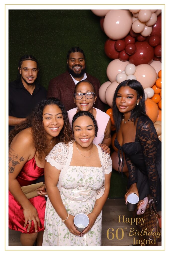 JJ Rock – family enjoying the digital photo booth experience at a 60th birthday celebration in Oshawa, Ontario featuring fun props and smiles for the camera